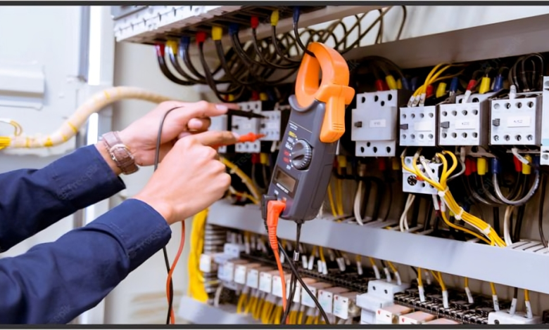 Electrician fixing Electrical board